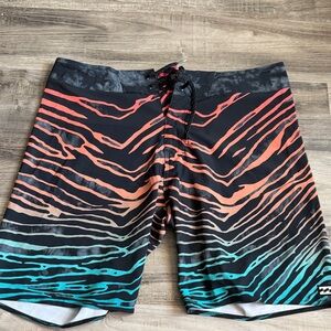 Billabong Black, Orange, and Teal Swim Board Shorts